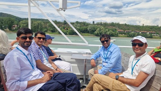 Scholars sitting on a boat