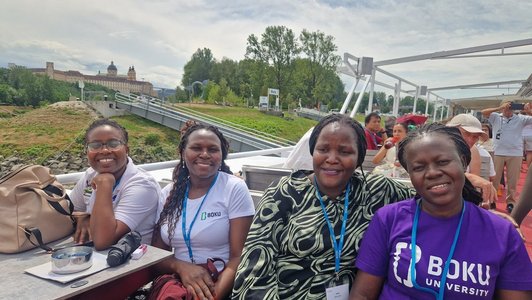 Scholars sitting on a boat