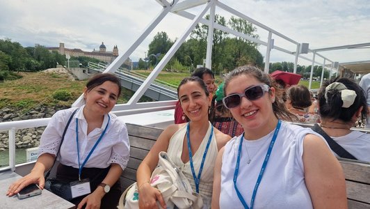 Scholars sitting on a boat